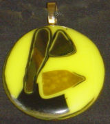 circular lime green browns and black pendant drop